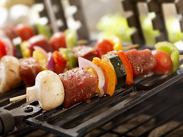 istock Beef and Vegetable Kabobs on a Outdoor BBQ 184331300