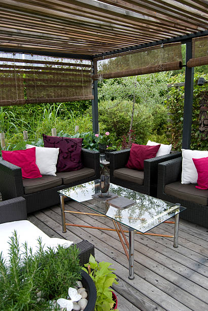 istock Modern garden with a pergola and wicker sofa 184331351
