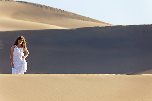 istock Young woman in the desert 184331979