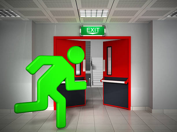 Emergency Green stick figure running through the emergency exit door.Similar images: figurine photos stock pictures, royalty-free photos & images