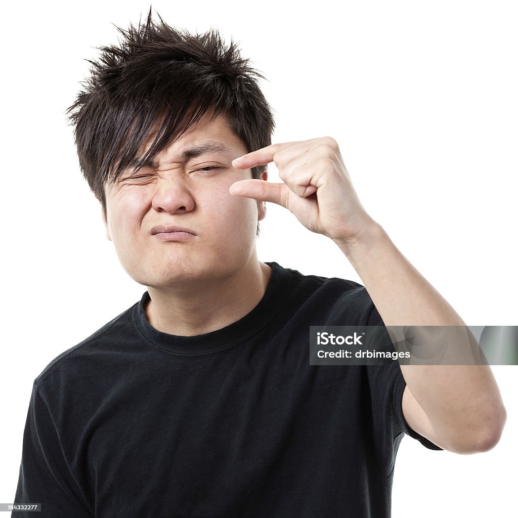 Male Portrait Portrait of a young man on a white background. Showing Stock Photo