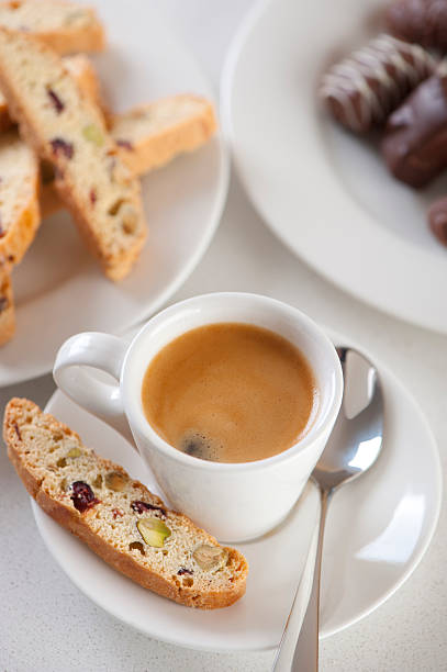 istock Espresso coffee with biscotti and chocolates 184333282