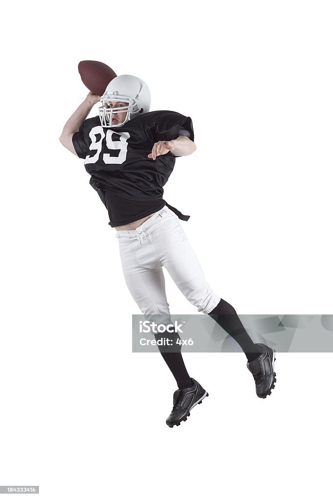 Joueur de Football en action - Photo de Activité libre de droits