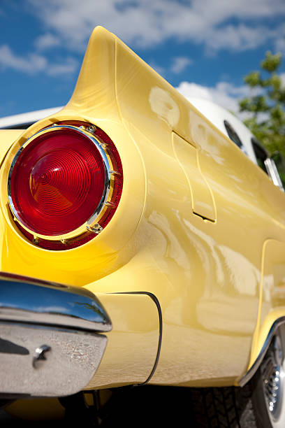 istock Rear View of Classic Car Against Blue Sky 184333618