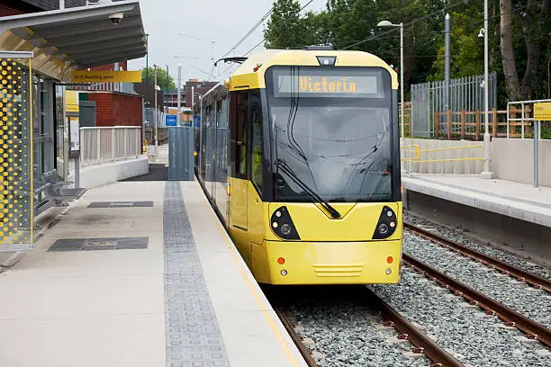 Manchester Metrolink tram at Chorlton station on the newly opened South Manchester extension, departing for Manchester Victoria. This is one of the new M5000 Flexity Swift high-floor trams, built by Bombardier Transportation.
