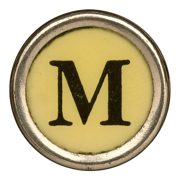 алфавит-буква м от старого ручной пишущая машинка. - letter m typewriter key typewriter alphabet стоковые фото и изображения