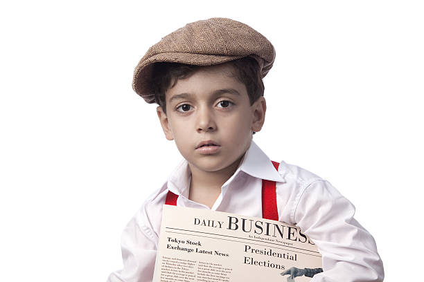 istock Paper delivery boy holding financial newspaper 184334290