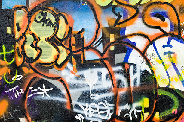Dettaglio di graffiti. Arte o atti di vandalismo. - foto stock