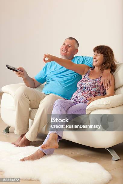 Mature Couple Watching Tv Stock Photo - Download Image Now - 50-54 Years, 50-59 Years, Adult