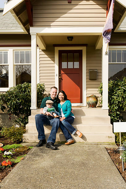 istock Happy Family at Home on Front Steps 184334949
