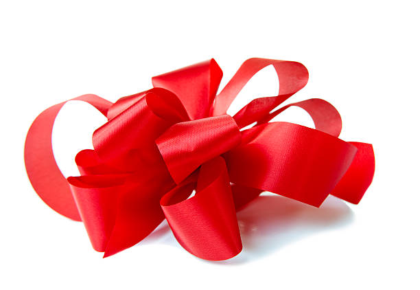 istock Side view of red handmade bow on white giftbox. Christmas. 184335034