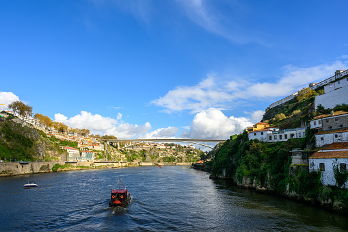 The bridge has a slim modern profile with good view of the city Porto.