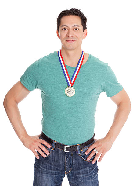istock Happy young man wearing medal 184335478