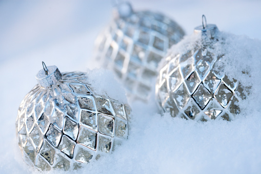christmas ornaments, christmas baubles in snow