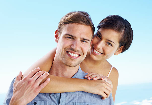 istock Woman hugging man from behind 184335971