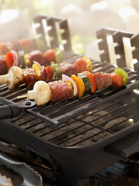 istock Beef and Vegetable Kabobs on a Outdoor BBQ 184336685