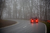 Picture of a car on the road on a gray day
