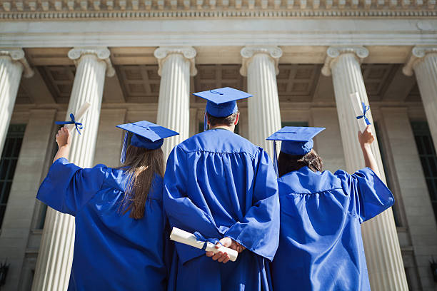 istock High School Student Graduates Reaching for University Higher Education 184337045