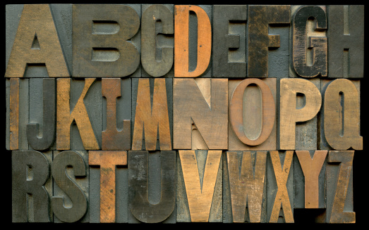 Wooden type blocks for hand typesetting or letterpress printing.