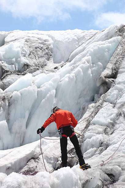 Mountaineer on a glacier stock photo