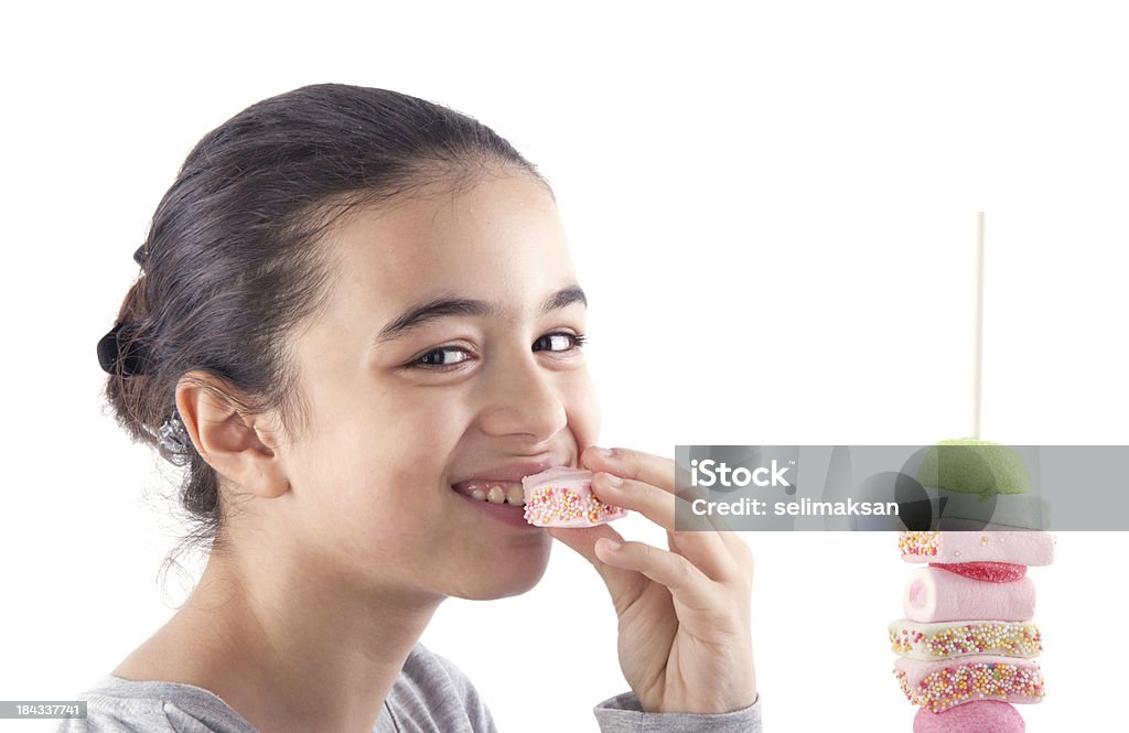 Menina comendo doces - Foto de stock de 8-9 Anos royalty-free