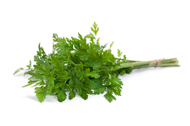 istock Bunch of ripe parsley isolated 184338090