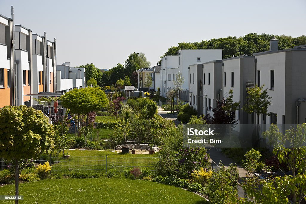 Row of New Townhouses real estate, Green Color Stock Photo