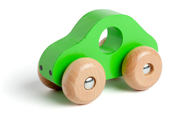 Green wooden toy car Green wooden toy car isolated on white. wooden car stock pictures, royalty-free photos & images