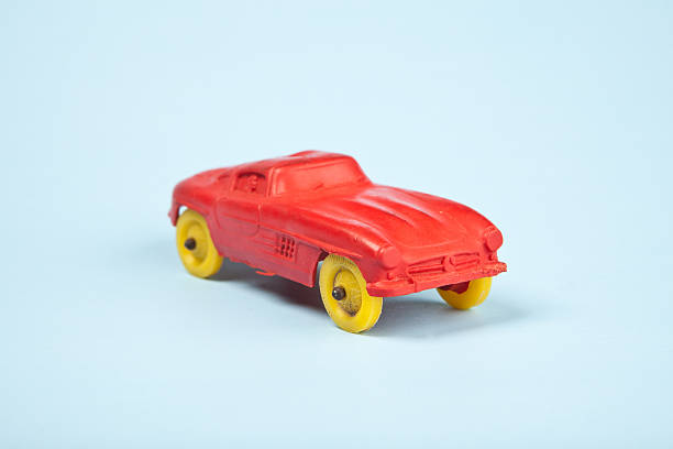 istock Vintage Red Plastic Car on Blue 184338778