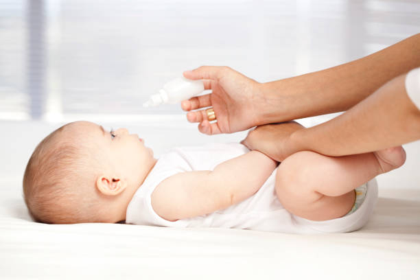 istock baby receives medication. 184338897