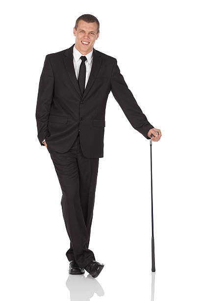 istock Businessman holding a golf club 184339000