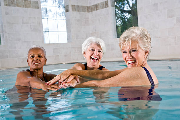 istock Multiracial senior women in water aerobics class 184339065