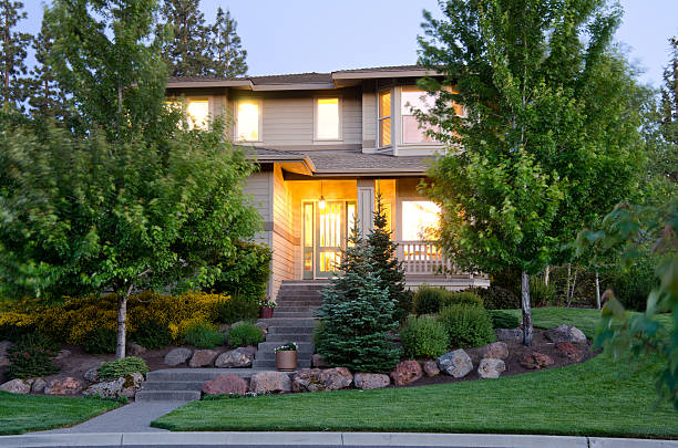 istock Twilight exterior of home and landscape 184339268