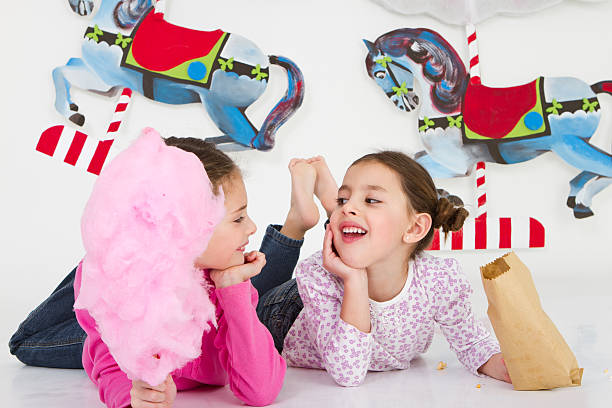 istock Happy friends having fun at amusement park - studio shot 184339314