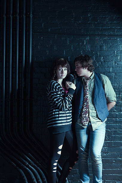 istock Urban Youth Couple with Black Wall 184340347