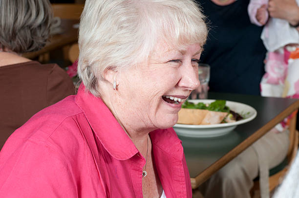 istock Woman Laughing at a Restaurant 184341338