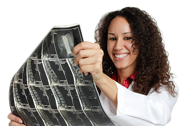 istock Mixed race female doctor with xray 184341512