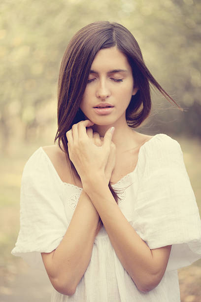 istock Beautiful woman standing outdoor 184342132