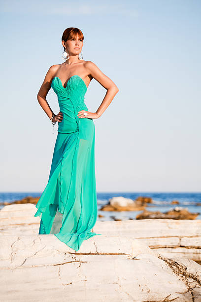 istock Fashion model posing on the seaside 184342349