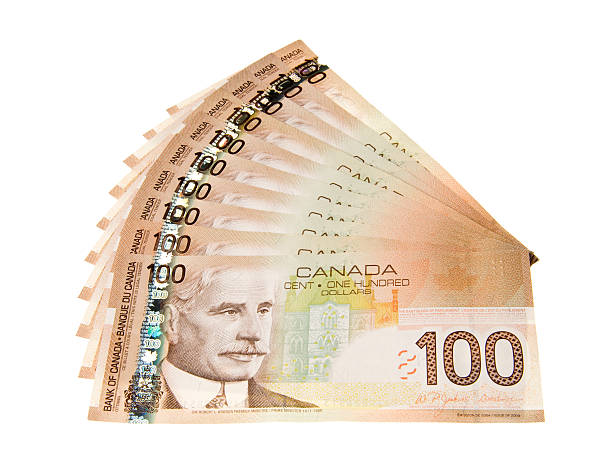 canadian 100 dollar bills - canadian currency fotografías e imágenes de stock