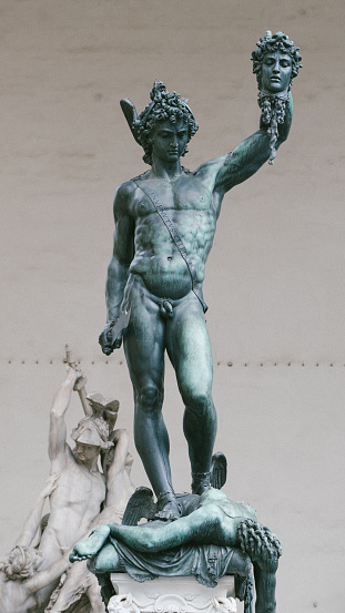 Perseus statue by Cellini in the historical center of Florence, Signoria Square, Italy
