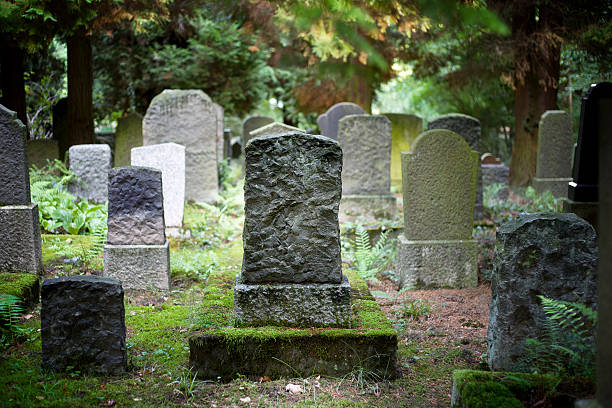 Rows of very old and weathered tombstones Rows of very old and weathered tombstones cemetery stock pictures, royalty-free photos & images