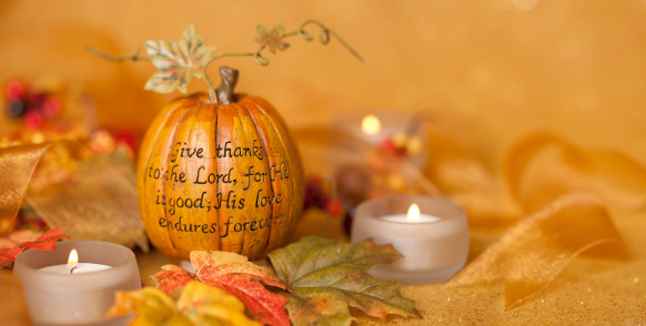 Thanksgiving verse with candles against a sparkling gold background.ALL NEW CHRISTMAS