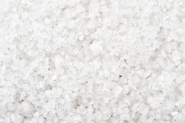 Photo of A background of White Sea salt