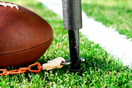 American Football - Third and Short measurement - Close up of football inches from a first down, Football Chain Marker