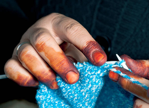 Ball of wool and knitting needles