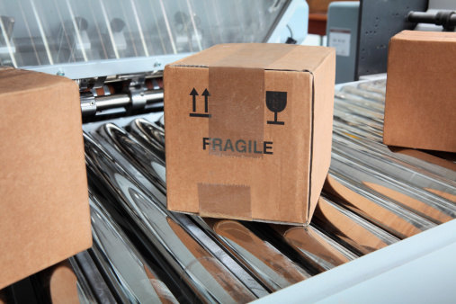 Cardboard boxes on packaging line. See my other similar photos: :
