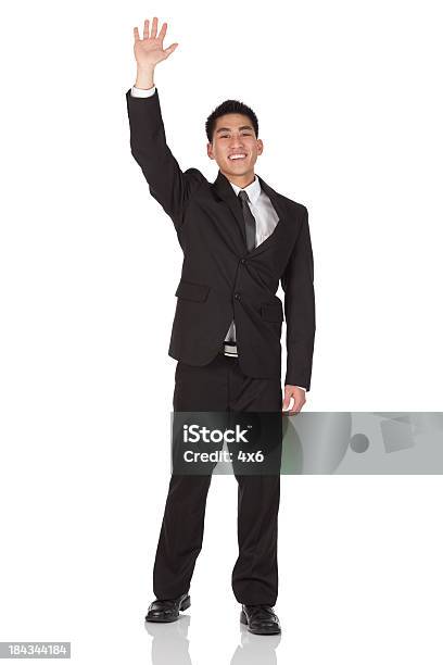 Businessman Waving His Hand Stock Photo - Download Image Now - Asian and Indian Ethnicities, Businessman, Full Length