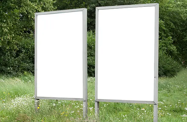 Photo of Standing outdoor billboards on grass