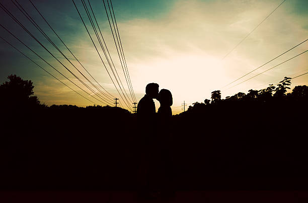 Silhouette of a Kiss stock photo